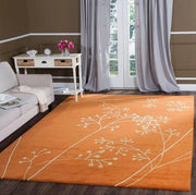 Elegant Orange & Cream Hand Tufted Wool Carpet with Floral Design